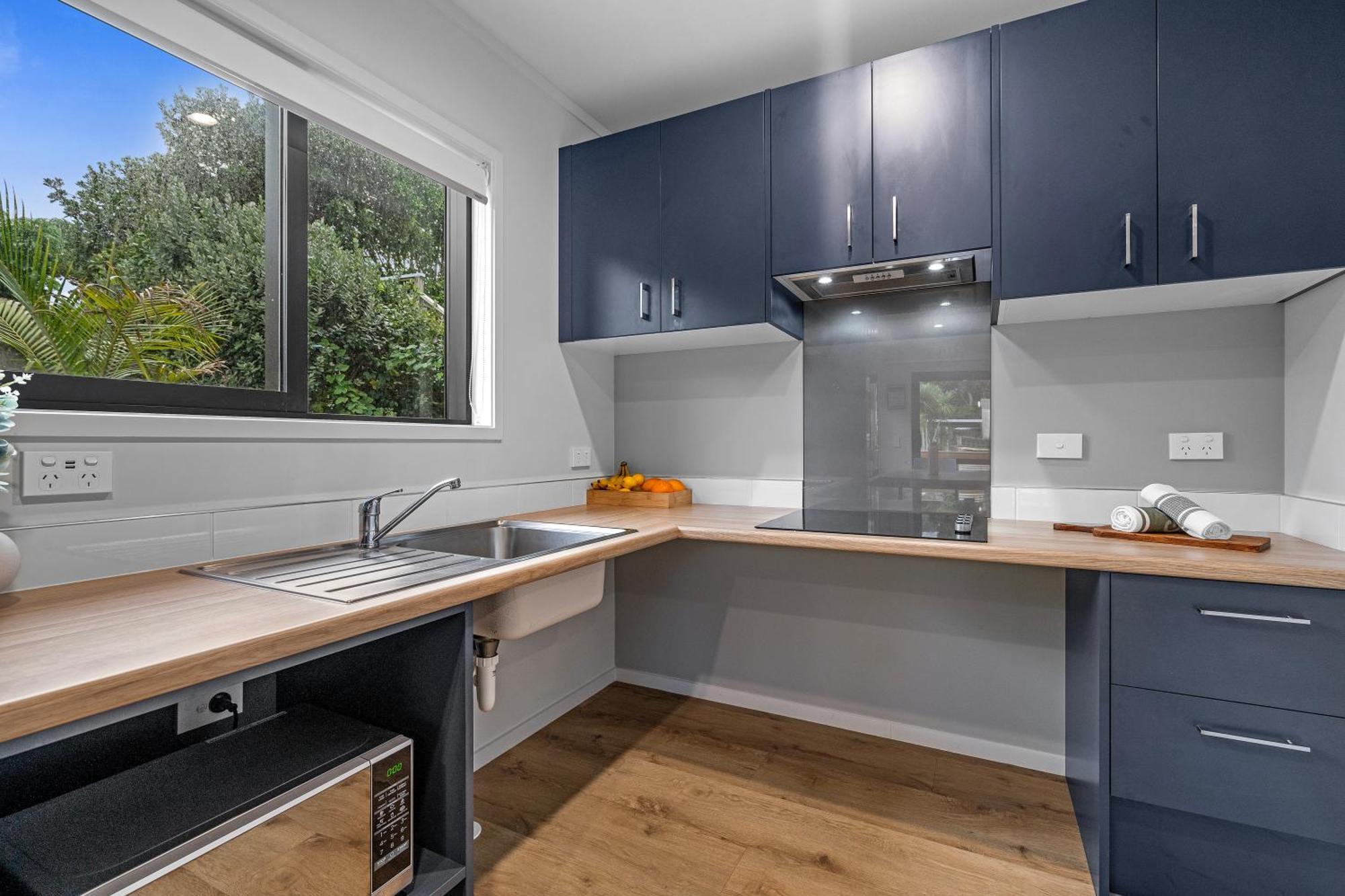 Tasman Holiday Parks - Waihi Beach Eksteriør bilde A modern kitchen